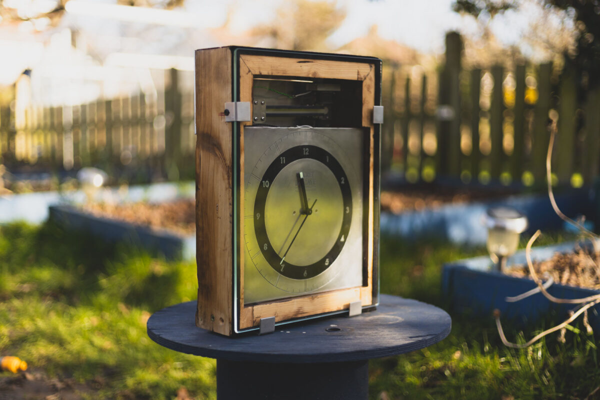 A Picture of my finished clock. Its in the garden with bright light.